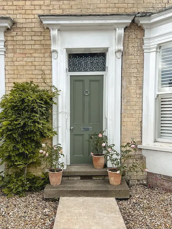 Sage Green Door with Rose Pots