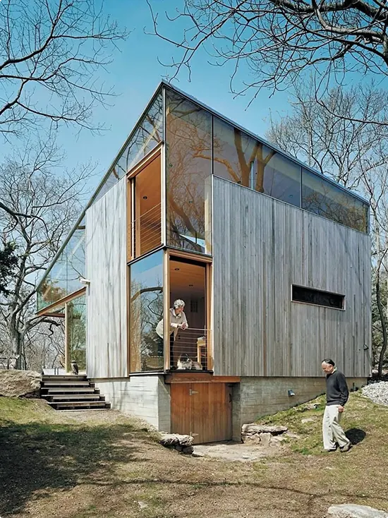 Small Modern Cabin with Weathered Wood Siding