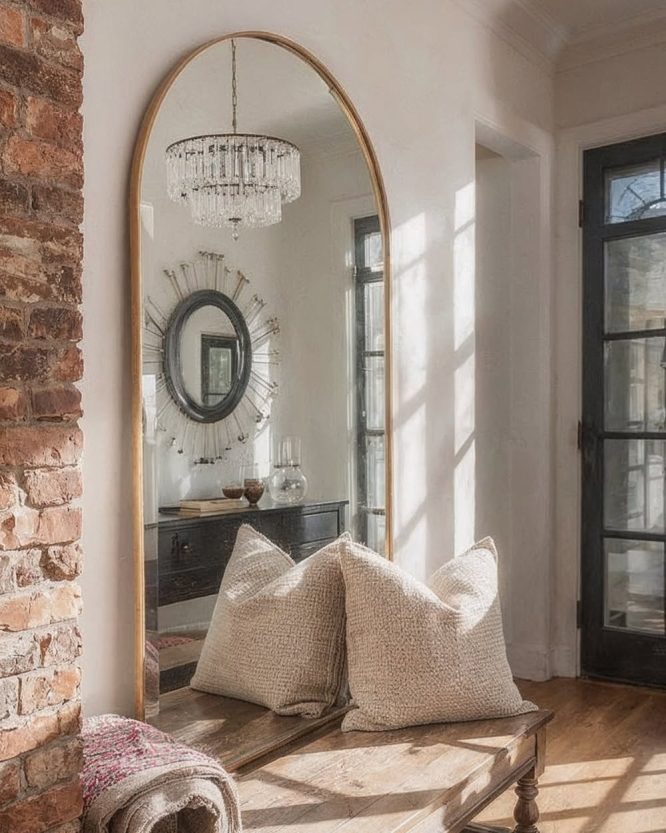 Tall Arched Mirror by Exposed Brick