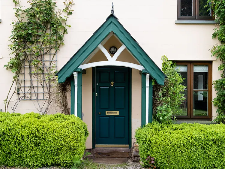 Teal Entry Door on the Gabled Porch