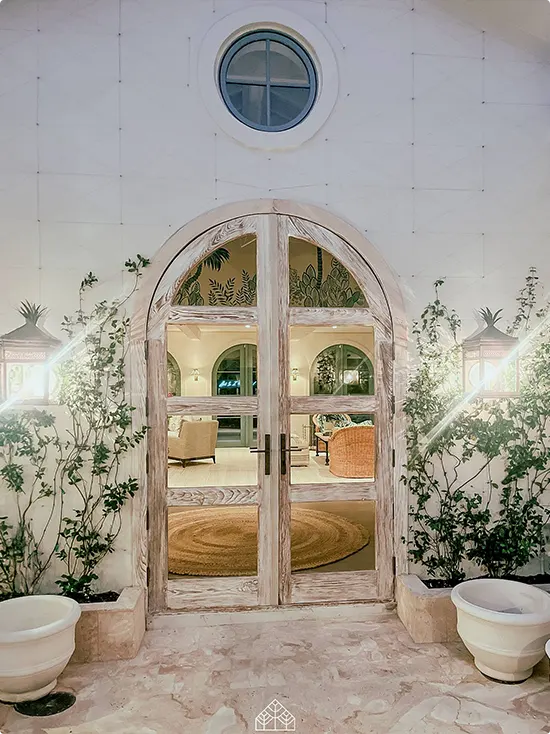 Two Arched Whitewashed Wood Sunroom Doors