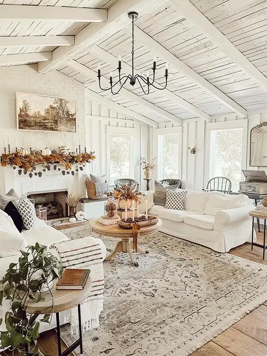 Whitewashed Beams in a Neutral Vaulted Living Room