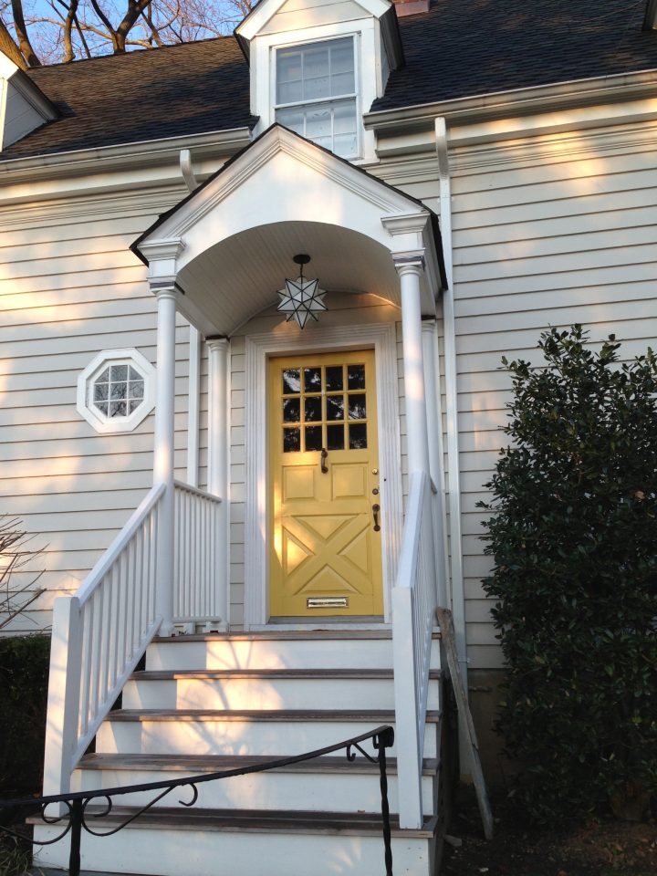 Gray House with Yellow Front Door