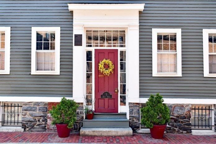 Deep Red Front Door with Yellow Wreath