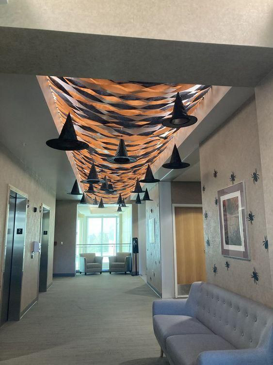 Orange and Black Canopy with a Dozen Witch Hats