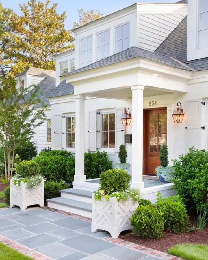 Two White Lattice Planters with Stemmed Boxwood Balls