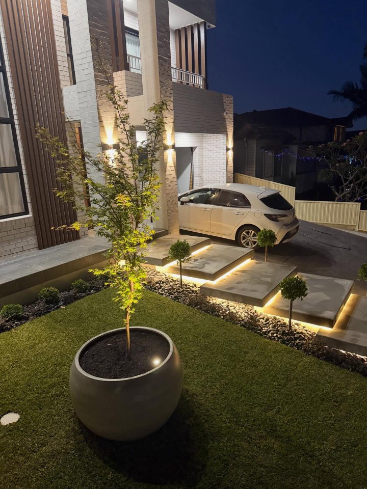 Uplighted Stepping Stones with a Round Planter