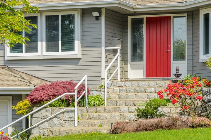 Vertical-panel red door for a split-level house