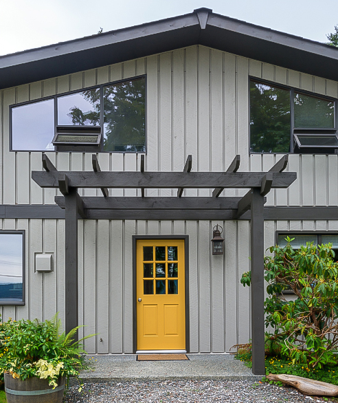 Yellow Door Under a Pergola