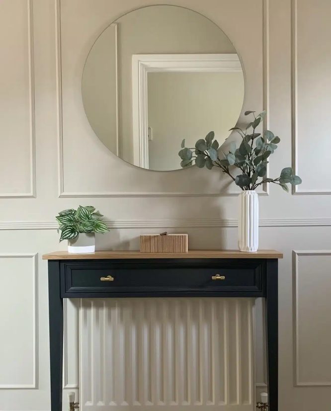 Console table above radiator in black
