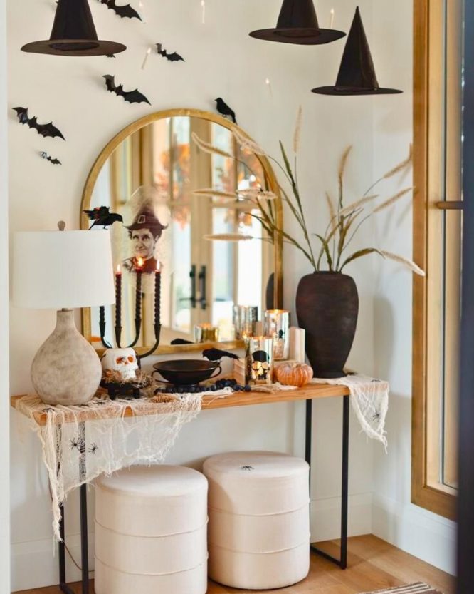 Console Table with Witch Hats Floating Above