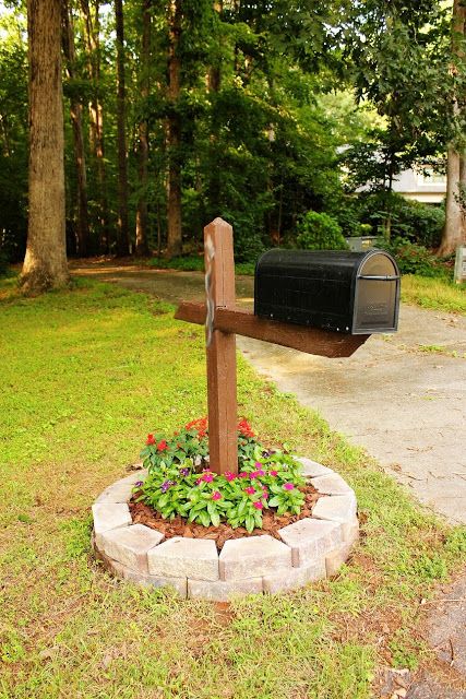 Dark Wood Post with Round Brick Flower Bed
