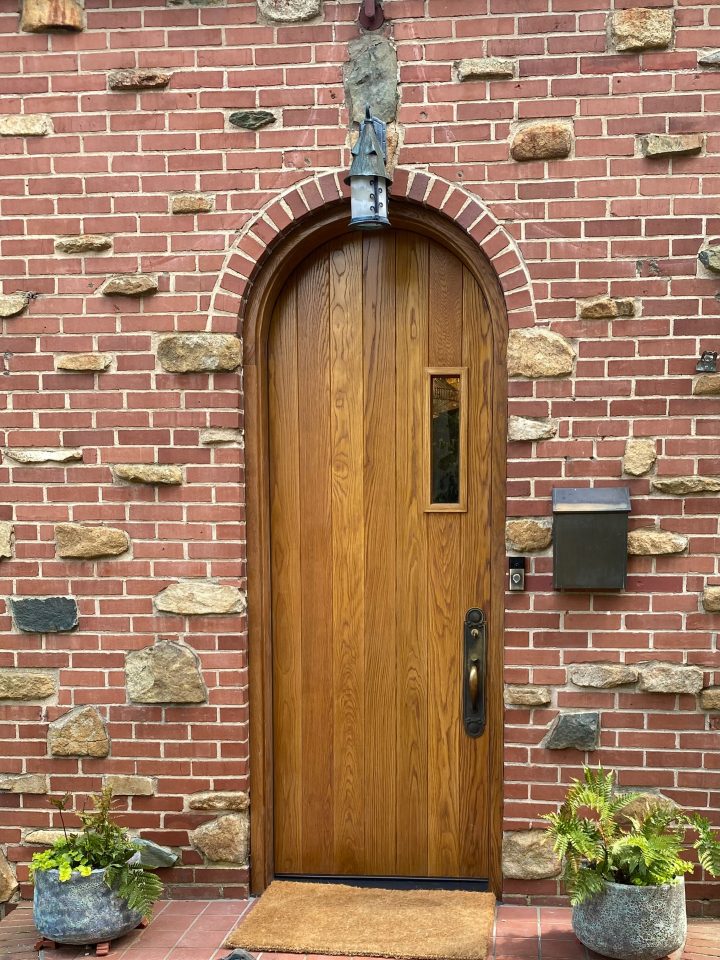 Rustic Brown Arched Plank Door