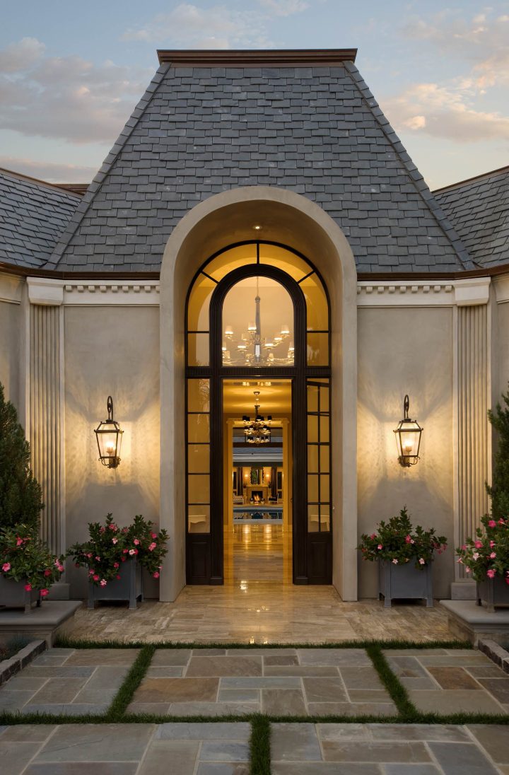 Tall Arched Entry With Black Framed Glass