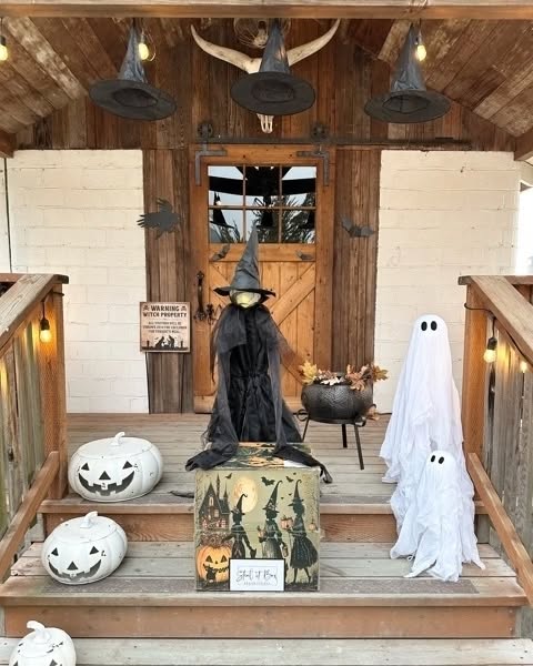 Tall Witch Figure by the Porch Steps