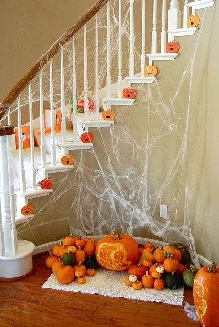Cobwebbed Railing and Pumpkin Patch