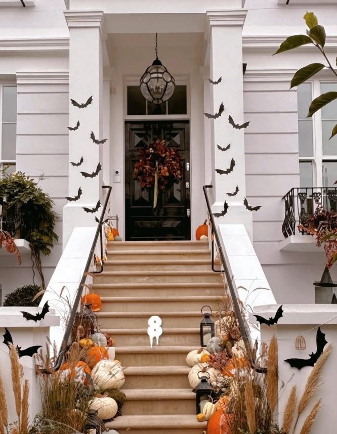 Entrance Staircase Lined with Bats and Pumpkins