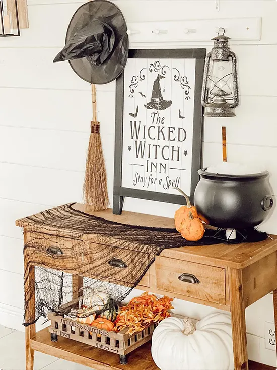 Console table named Wicked Witch Inn