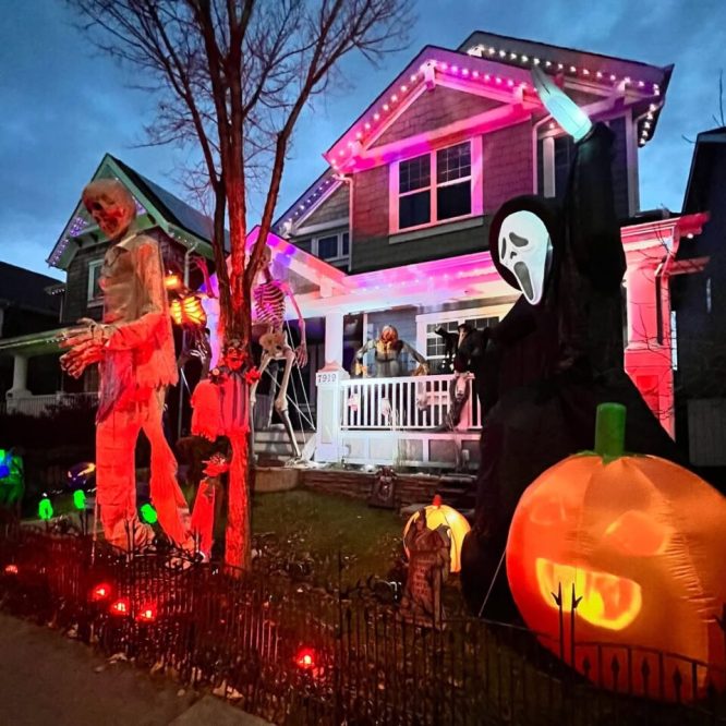 Red-Lit Zombies and Masked Figure Display