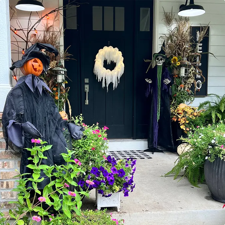 Scarecrow witches at the door