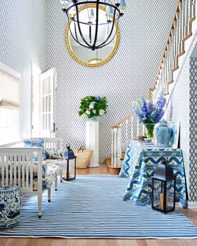 Bold Blue and White Rug in a Two-Story Entry