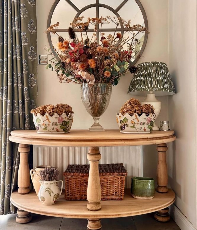 Farmhouse Round Table with Turned Legs and Dried Florals