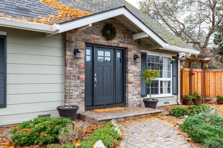 Black Craftsman Door with Stone Surround