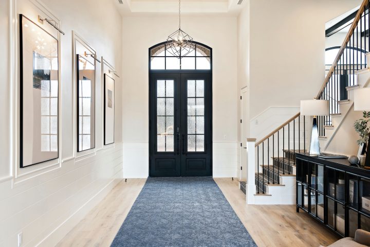 Black Double Entry Doors With a Glass Panel