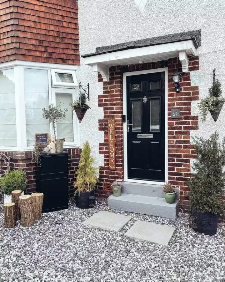 Brick nook with a black door