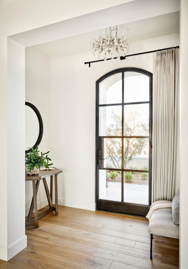 Tall Arched Black Steel Entry Door